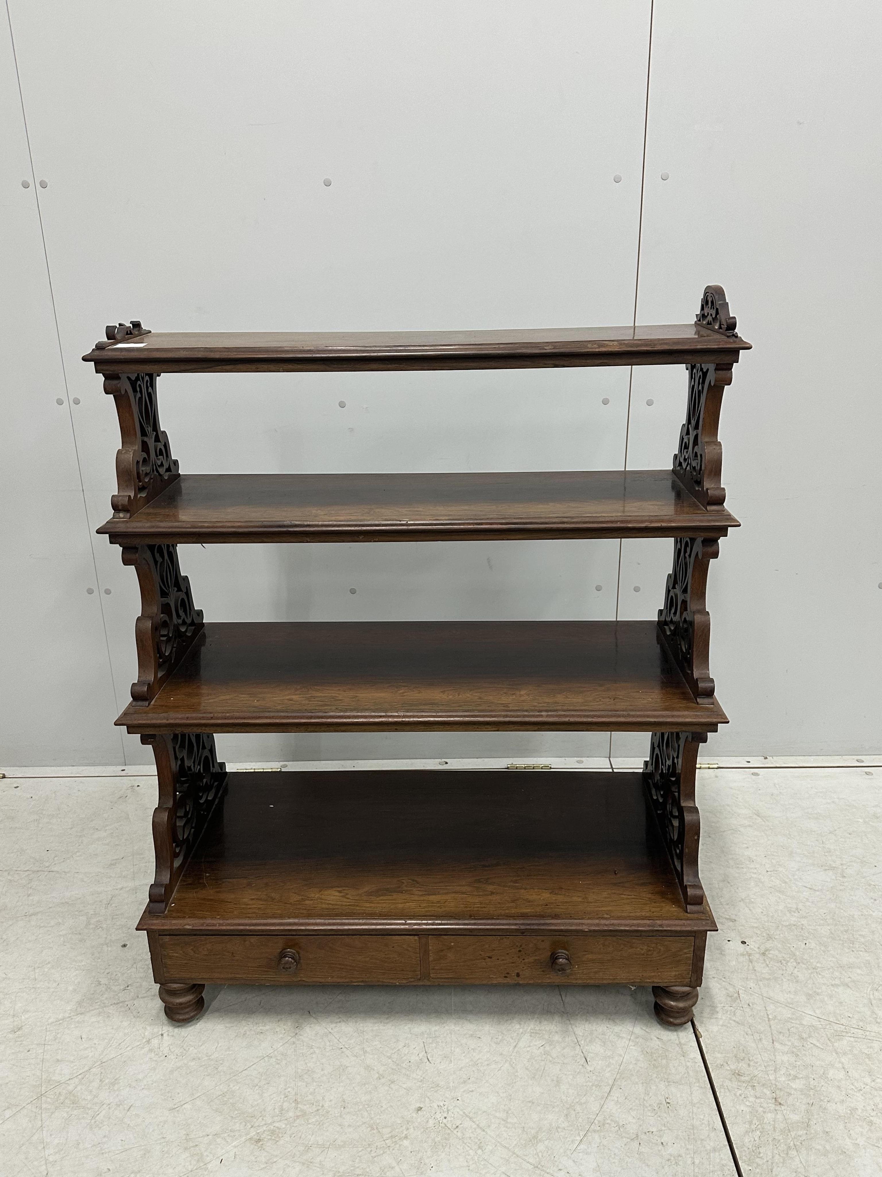 A Victorian rosewood graduated open bookcase, width 91cm, depth 45cm, height 113cm. Condition - poor to fair